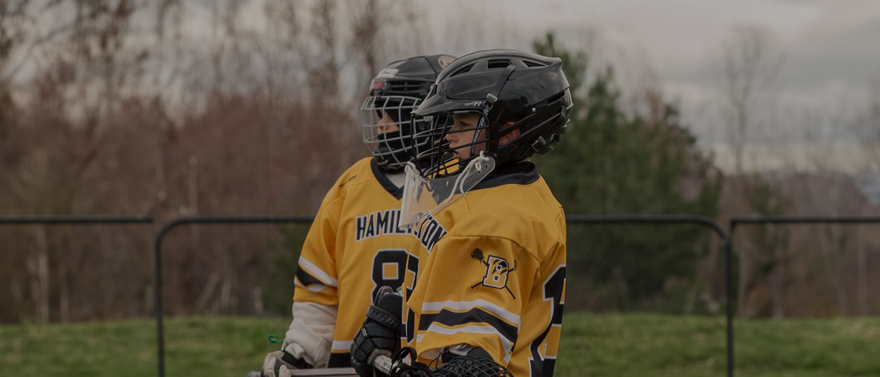 Youth Lacrosse Players wearing Custom Team Jerseys