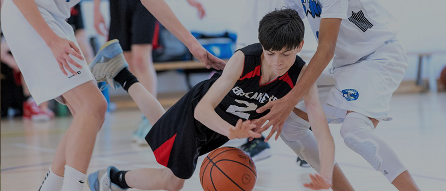 Youth Basketball Player Wearing Custom Uniform